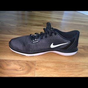 Black Nike training shoes